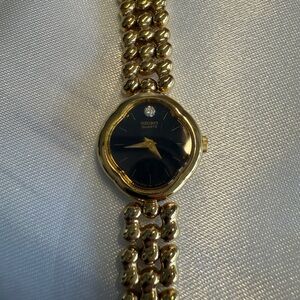 Seiko Women's Gold and Black Quartz Watch